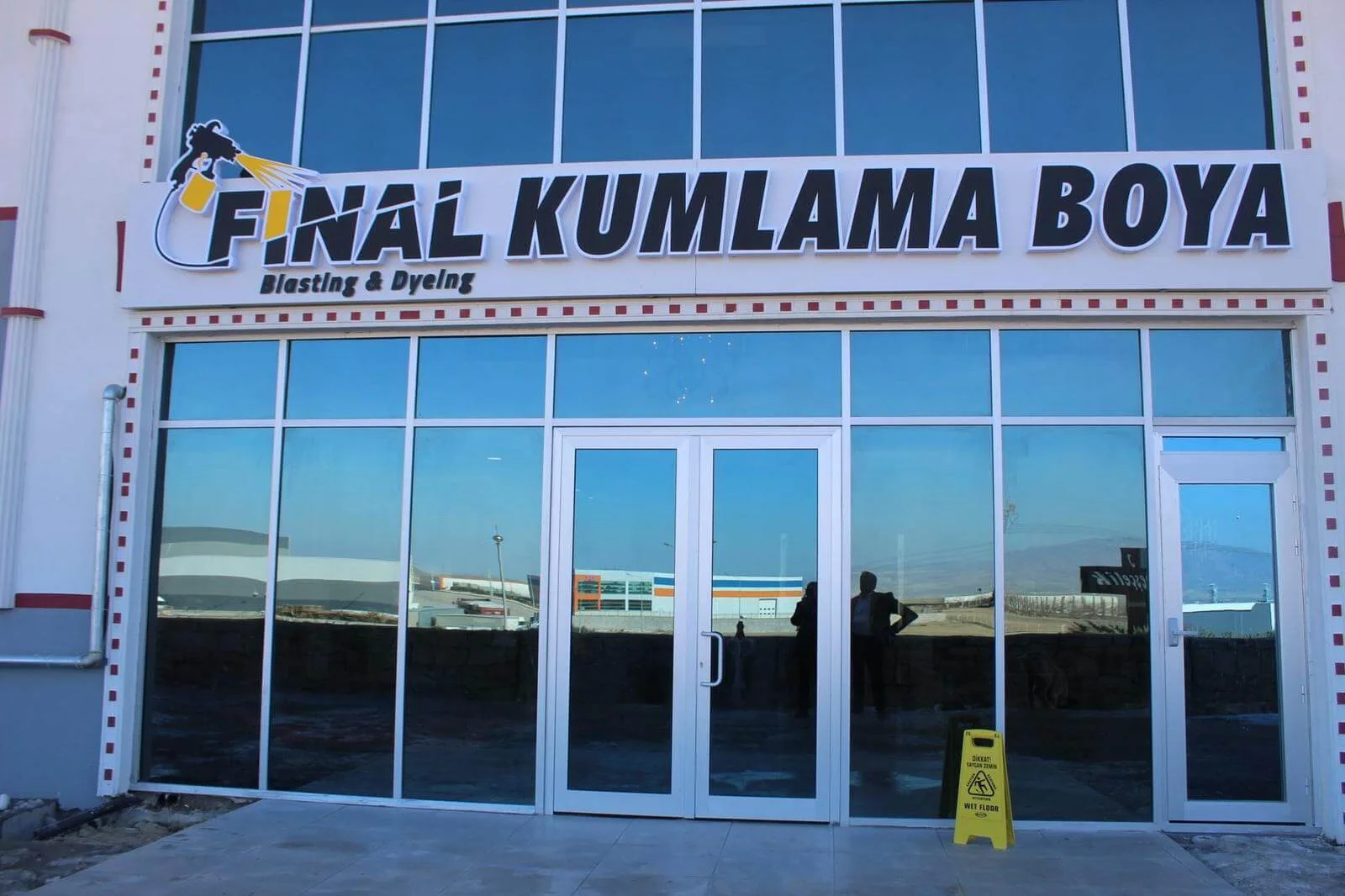 Entrance and company sign of the CED Final facility
